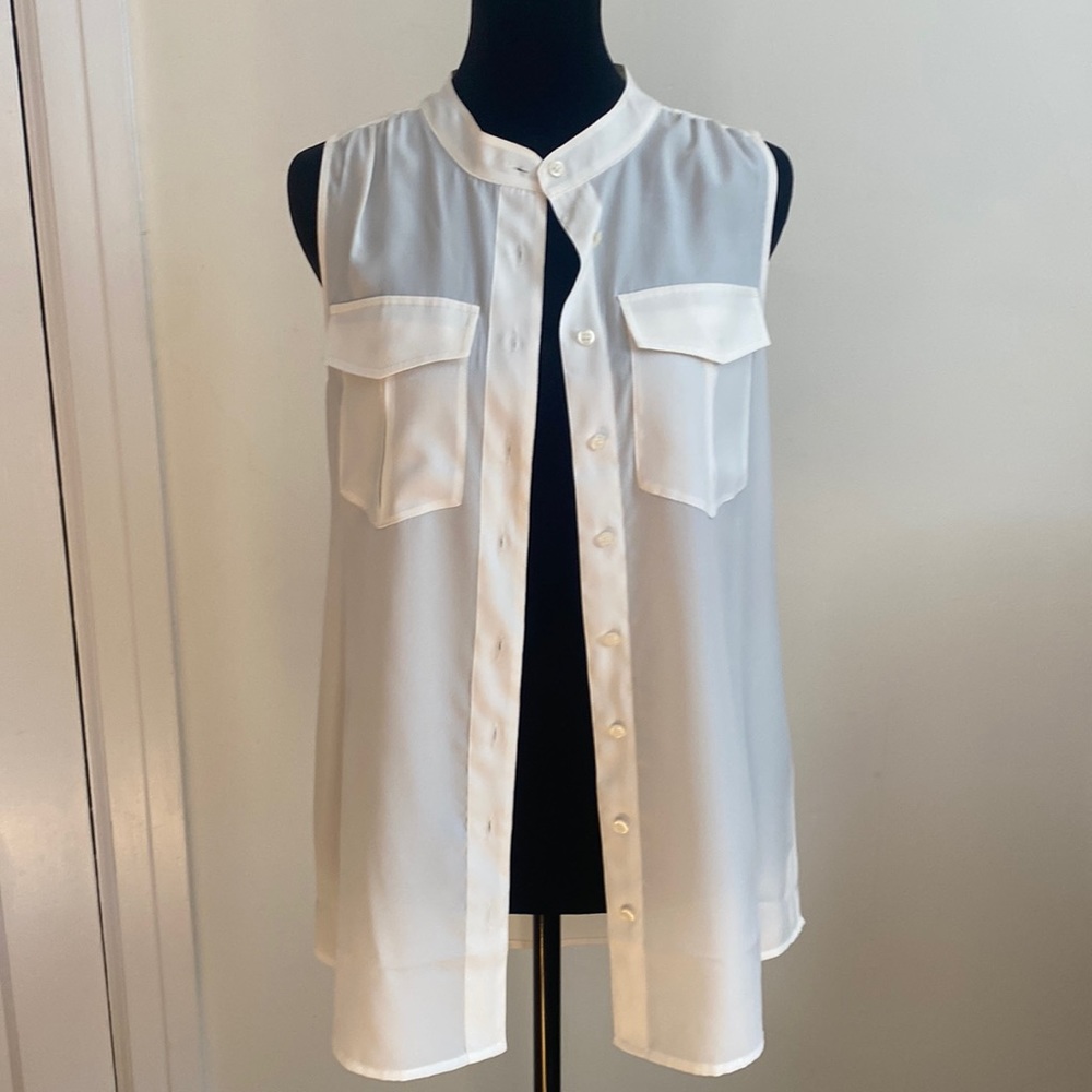 Perfect white button down sleeveless top. Everyday essential for work or play!